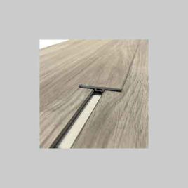 Profilo di raccordo per pavimento in spc colore noce dim. 240x4,5 cm. Sp. 7 mm